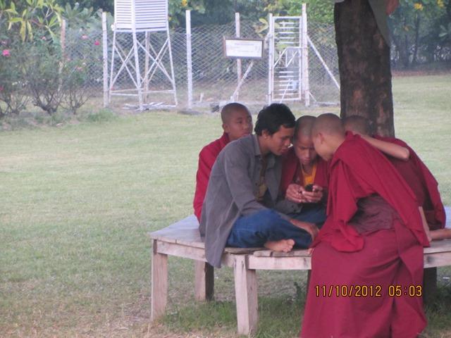 Young Monks Playing Cell Phone Game 11-10-2012